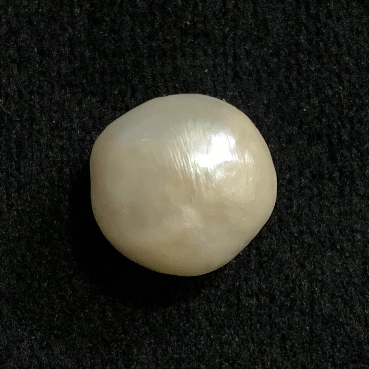 Natural Pearl - 10.79 Carats/11.97 Ratti